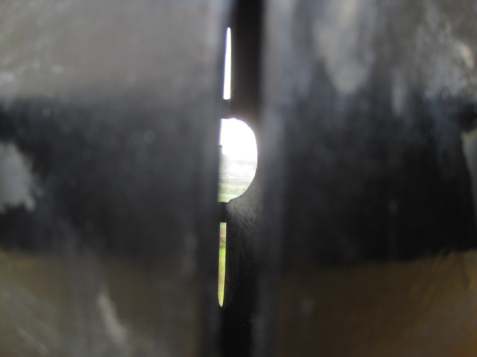 I believe it's a trick of the eye, but I couldn't get a shot through it to show you 