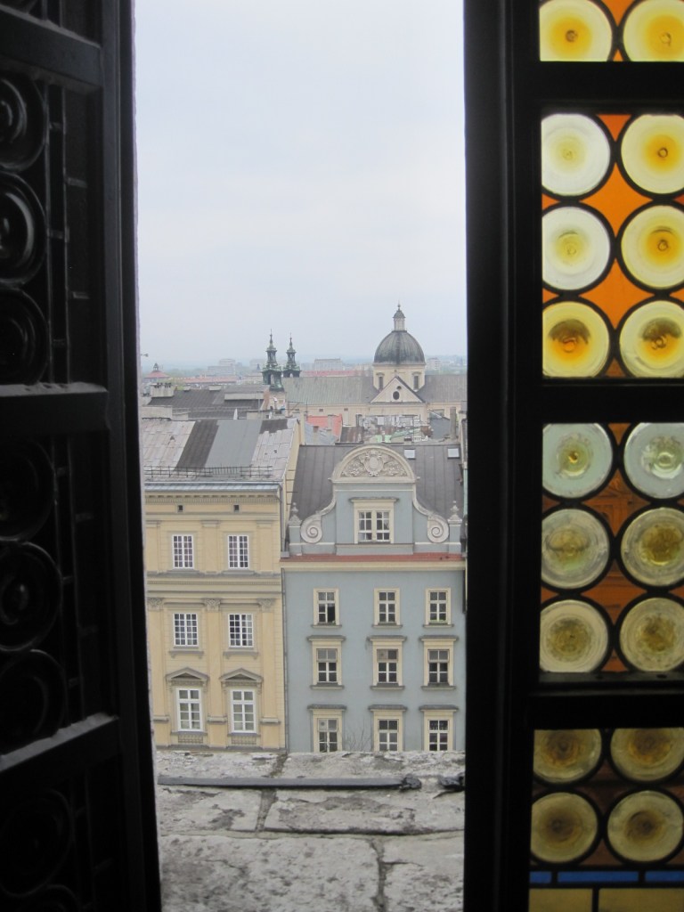 Through the windows of the bell tower of the Ratusz or Town Hall in Krakow
