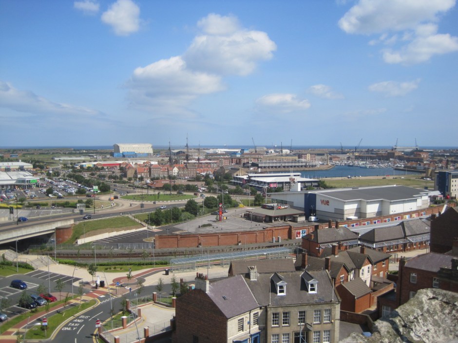 The railway station, and beyond, the Historic Quay and marina 