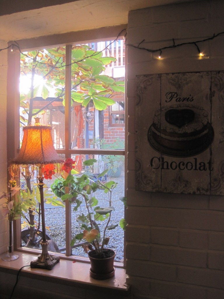 With it's cosy inside, looking out to the courtyard