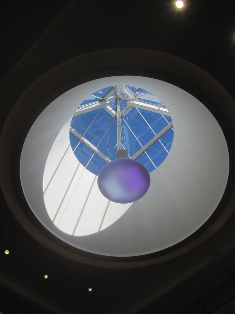 "Windows" in the ceiling reveal the blue beyond