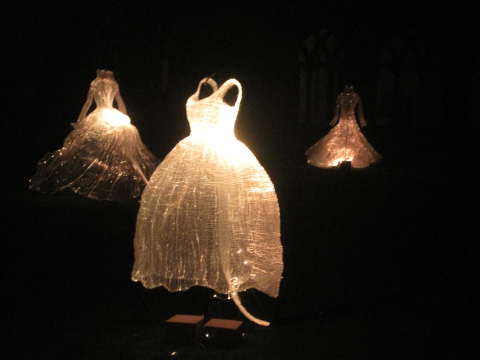 The frocks shimmered in the dark and then began to change colour