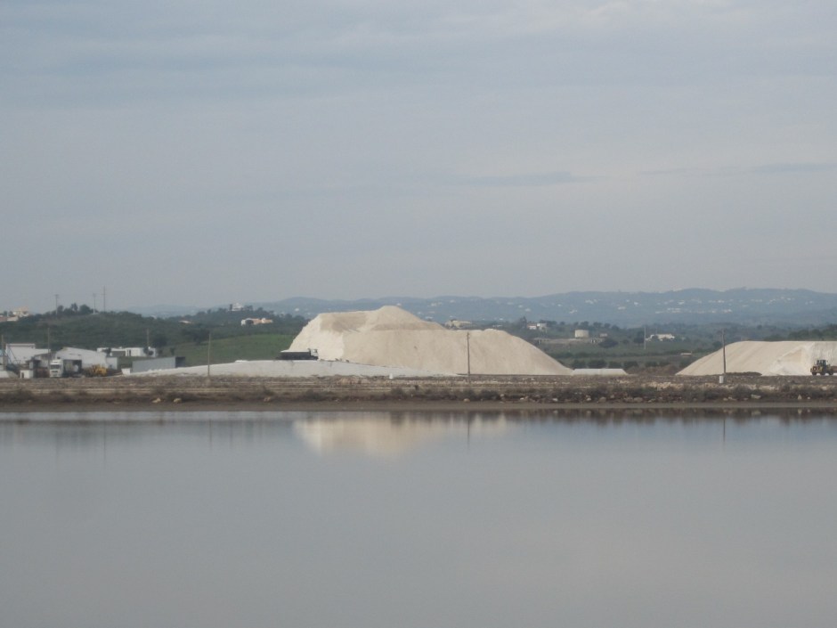 A salt mountain, carefully harvested.