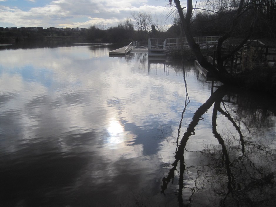 I loved the reflections in the water and that hint of blue sky 