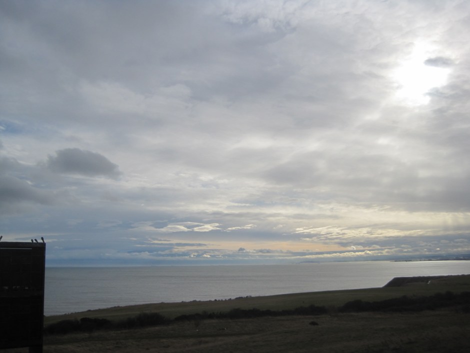 Layer upon layer of cloud rolls out to sea