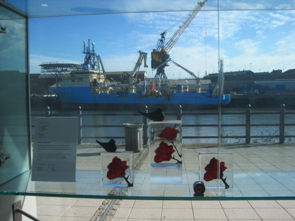 Keep an eye on the boats while you admire the glassware