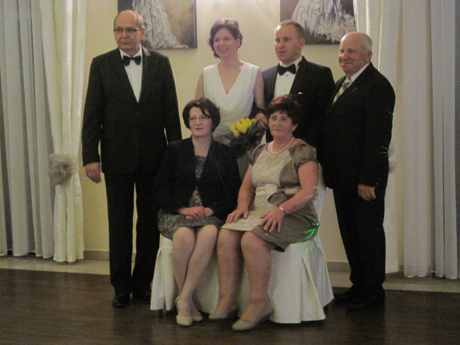 The bride and groom with parents