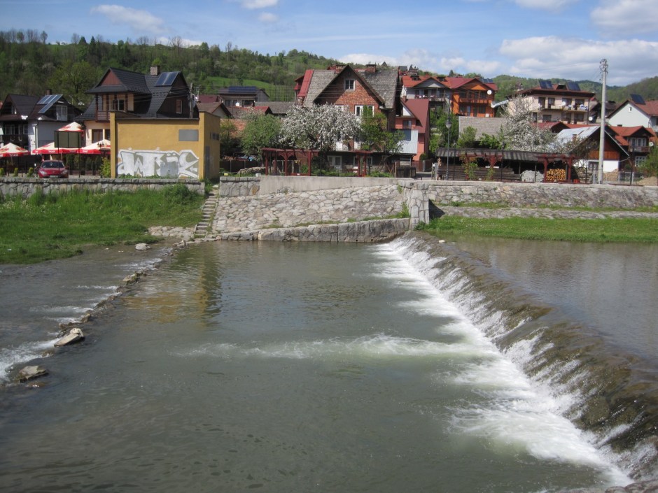 And always, the river, rushing along beside