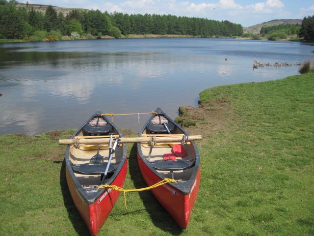 Two shiny red canoes! A rarity at the reservoir