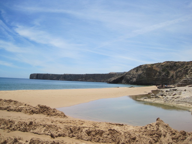 The town beach at Sagres, with the Fortaleza in the distance