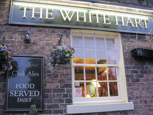 I glanced in at the village pub, half tempted