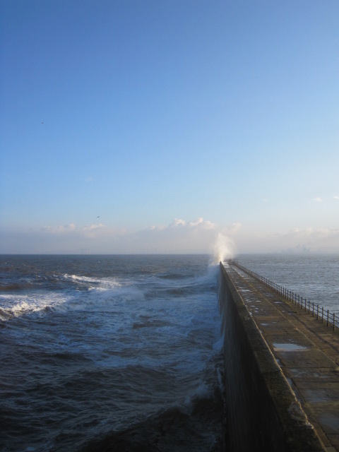 Whoosh goes the sea, against the pier!