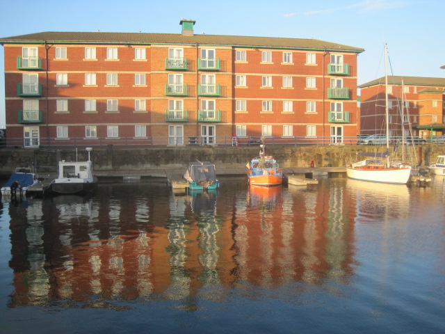 The colours reflect so well in the still water