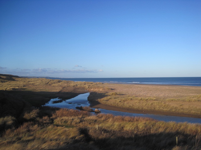 With the sun so low, the water glimmers electric blue