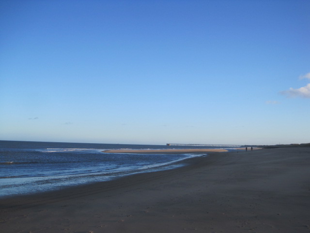 The shadows have swept the beach bare