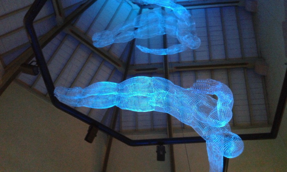 Suspended beneath the timbered ceiling 