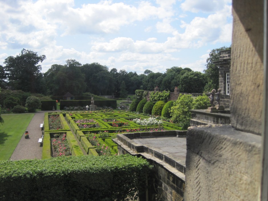 Mounting the West Staircase, I look out at the gardens