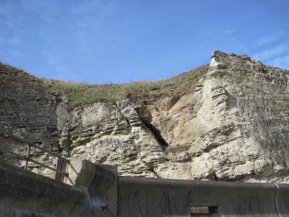 Overhead, the cliffs menace!