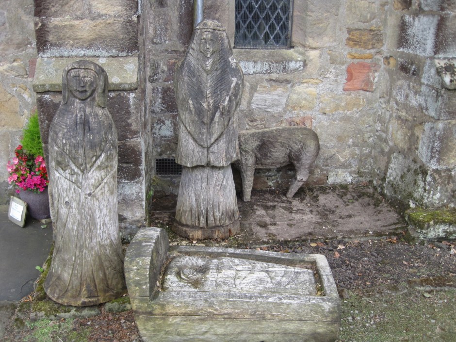 A wooden nativity outside St. Cuthbert's
