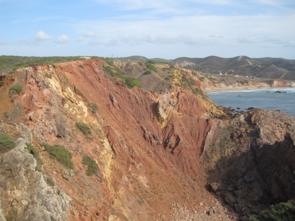 The red cliffs tumbling away 