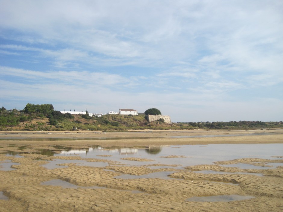 The fortress reflected in the salty puddles