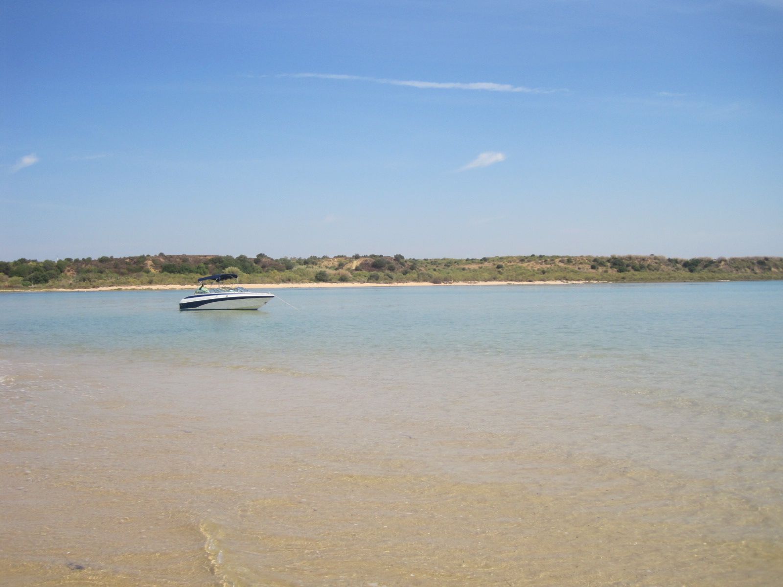 Their boat bobbing in the bay